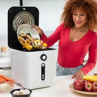 Indoor electric kitchen composter turns organic waste into compost in 48  hours