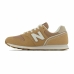 Dames casual sneakers New Balance 373 v2 Bruin