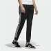 Pantalone per Adulti Adidas Essentials Trackpant Nero Uomo