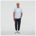 Pánské tričko s krátkým rukávem New Balance Essentials Stacked Logo Indogově modrá (L)